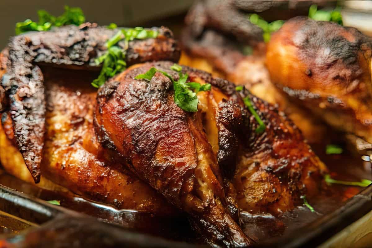 This baked rotisserie chicken is mind blowing delicious. It is double brined; so it takes two days of preparation before you serve it but the steps are simple. The chicken is so juicy and the skin is so crispy - it's addicting actually. Note: You may want to do two chickens.